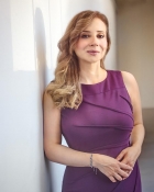 CARLA W.