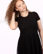 JANAYA W.