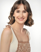 ELIF G.