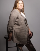 TRACEY F.