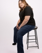 TRACEY F.