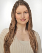 ALEXANDRA M.