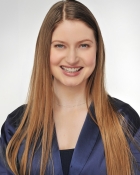 ALEXANDRA M.