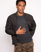 KELVIN B.