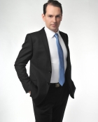 TOM P.