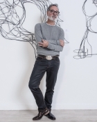 ROGER L.