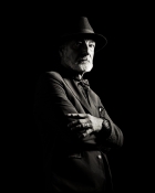 ROGER L.